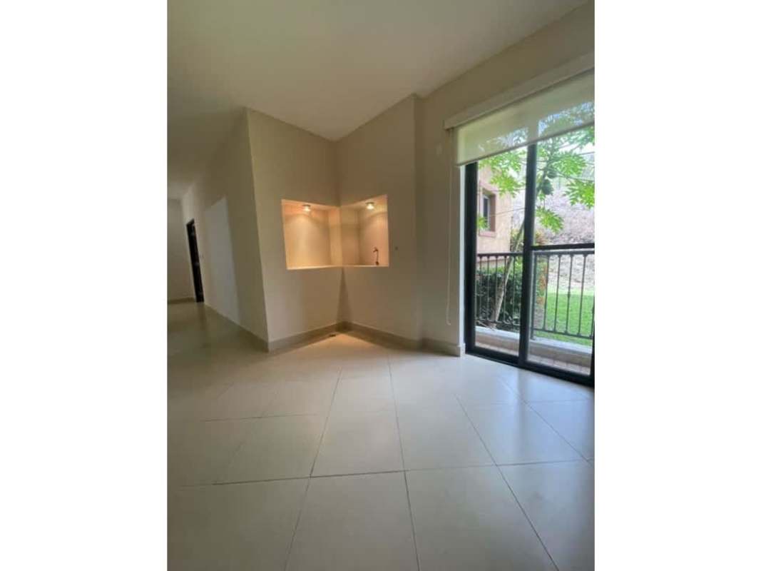 Living dining area with floor to ceiling windows and terrace access PH Embassy Club Clayton Panama