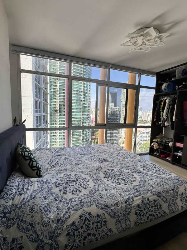 Studio bedroom with city skyline view from PH Colores high-rise Panama City