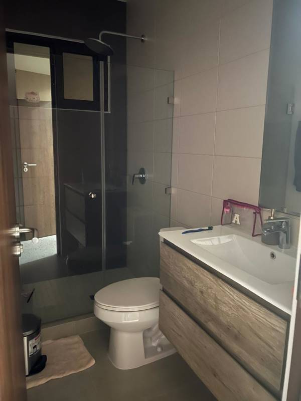 L-shaped kitchen with modern cabinets oven stove Golf Gardens Brisas del Golf Panama