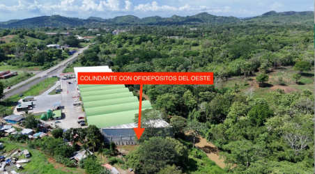 Aerial view of warehouses and industrial facilities close to Feuillet Capira land parcel Panama Oeste