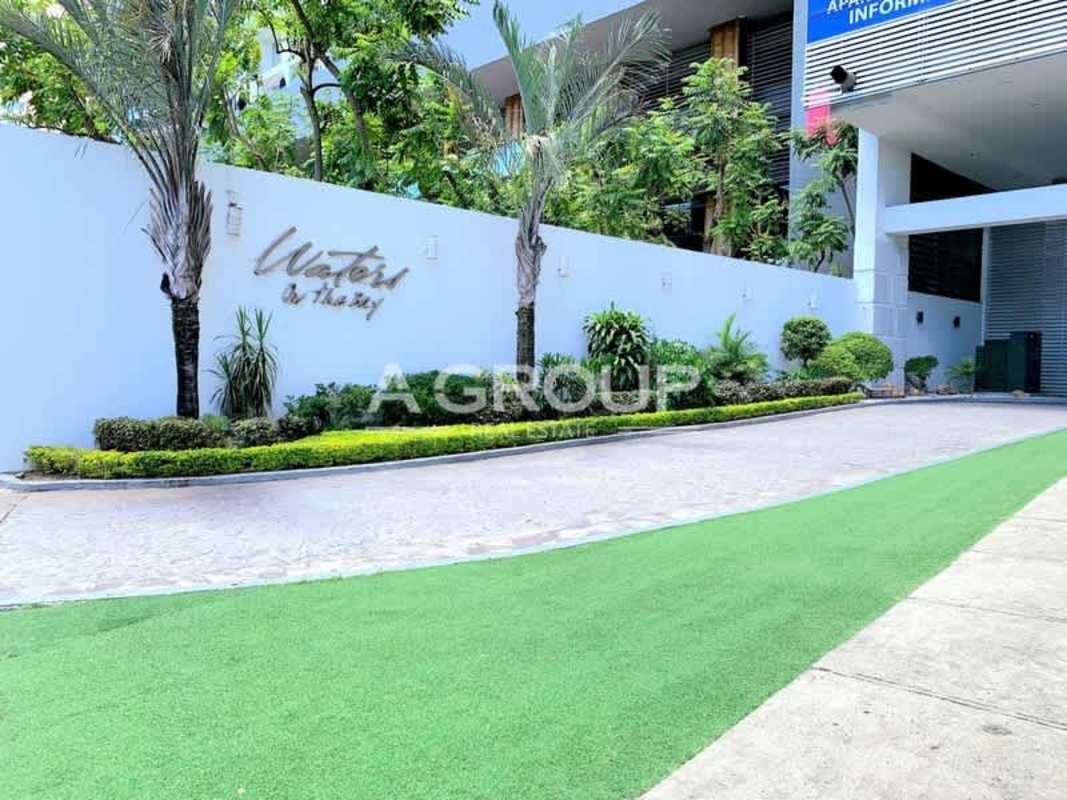 Modern landscaped driveway with palm trees and stylish canopy PH Waters on the Bay Panama City