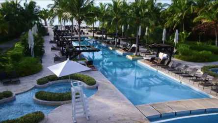 Tropical resort pool and beach club at Buenaventura Resort Panama
