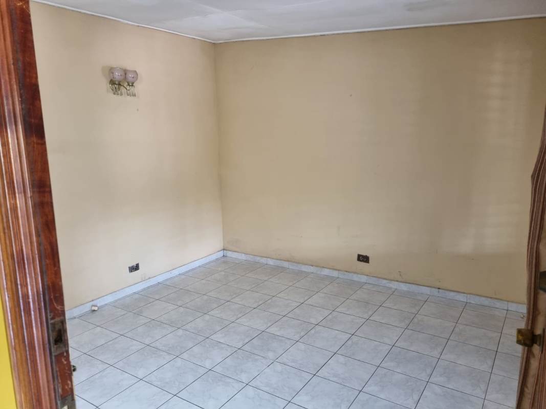Bedroom with closet and ceiling fan tiled floor family house in Panama