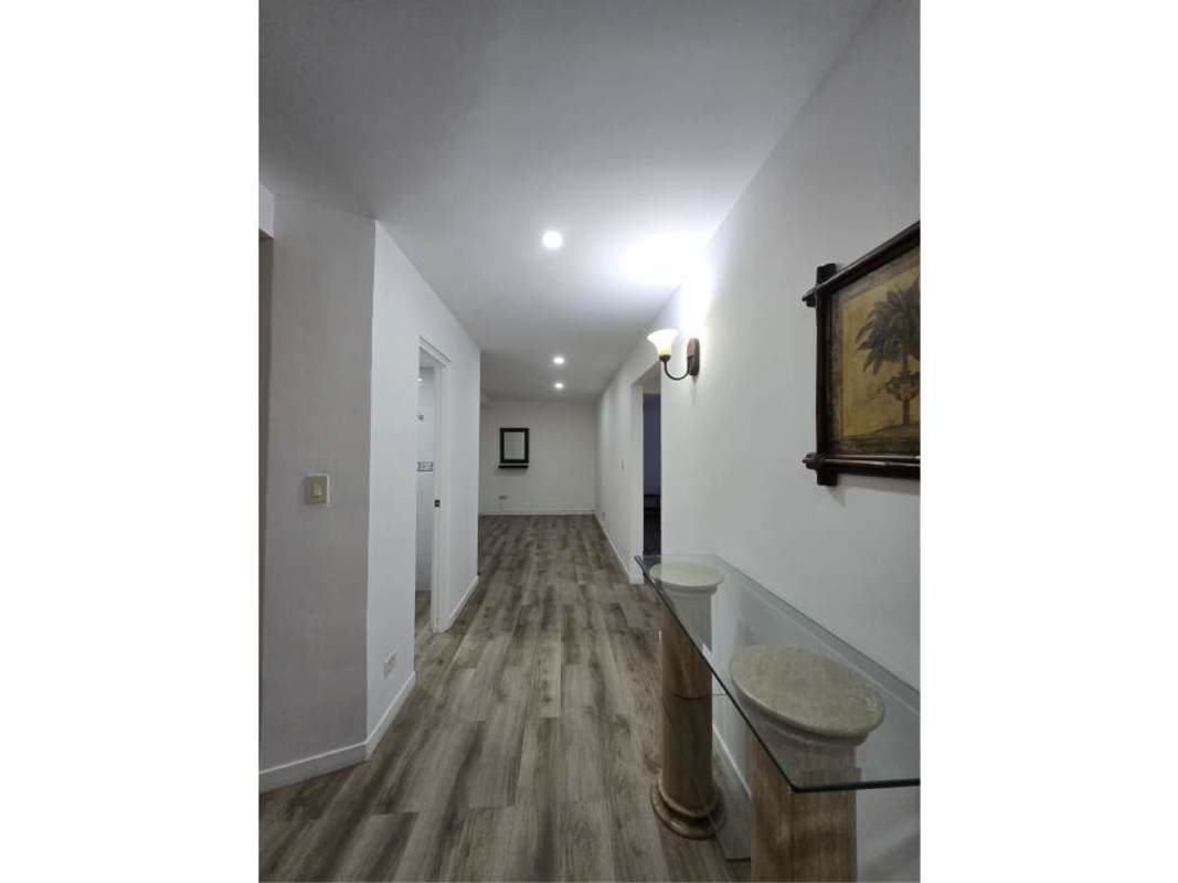 Modern hallway with lighting, glass console, wood floors PH Clayton Tower Clayton Panama