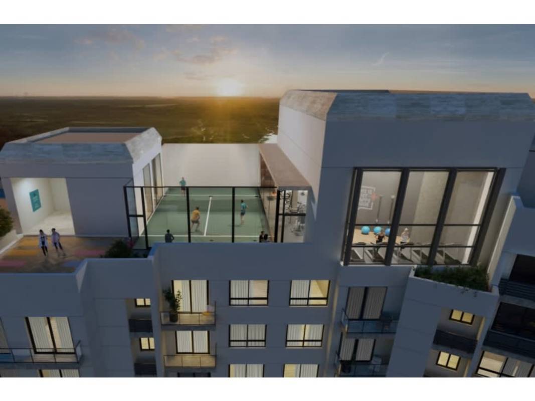 Rooftop with sports courts fitness center glass fencing Ocean House Santa María