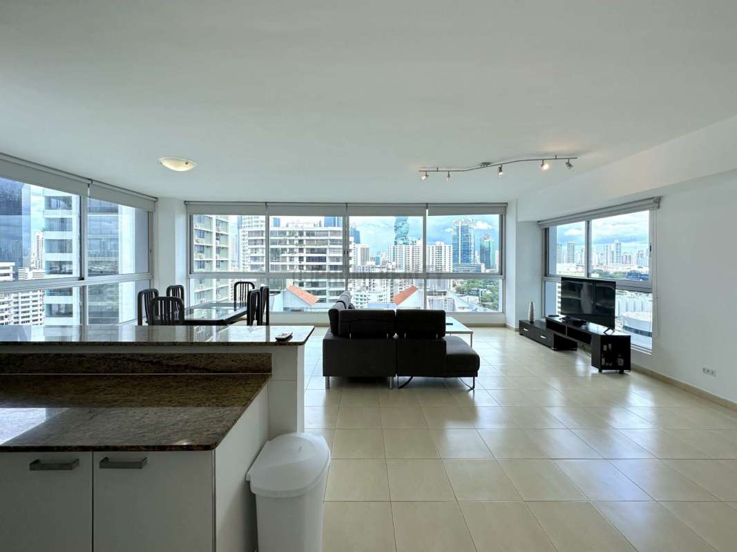 Modern kitchen with granite countertops and open layout in GrandBay Tower Panama City