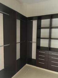 Playground area with swings and lush garden in Matisse Panama Pacifico community for sale