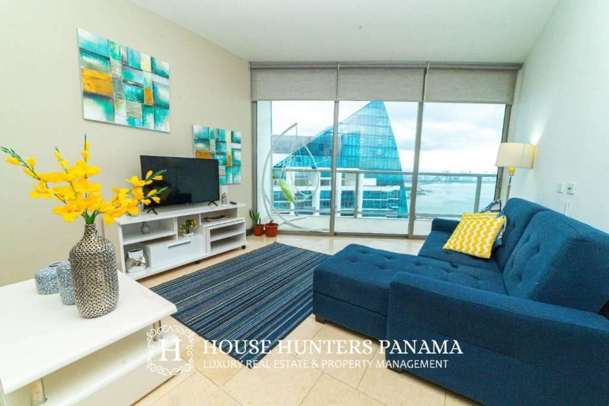 Modern bathroom with glass shower and beige tiles The Ocean Club Punta Pacifica Panama