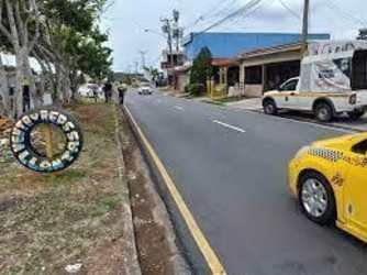 Parking zone with multiple vehicles in front of Tecal Commercial Plaza stores in Arraiján Panama