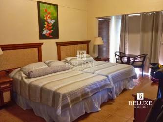 Bedroom with twin beds traditional decor Costa Blanca Golf Beach villa Panama