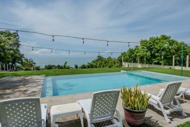 Private trail through tropical gardens leading to bohío cabana and beachfront in Costa Esmeralda Panama