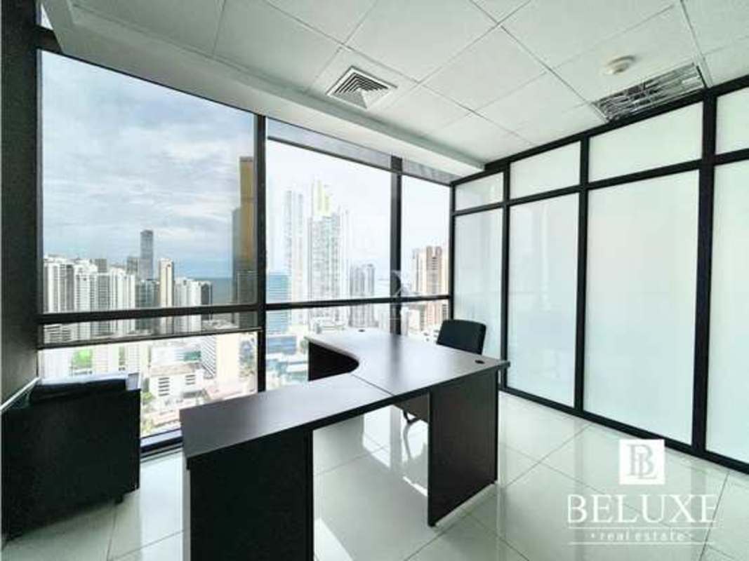 Glass-partitioned executive office with skyline view in PH Towerbank Panama