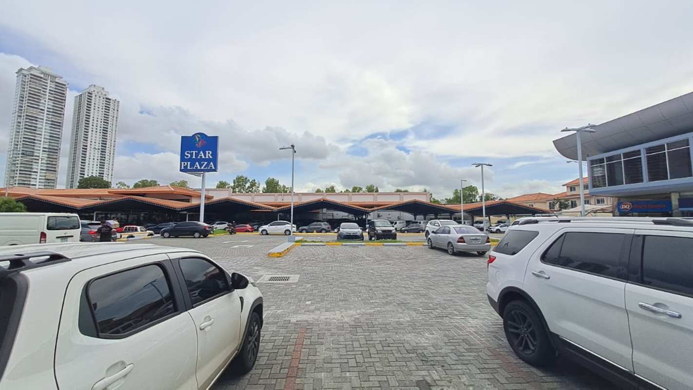Unfurnished interior commercial space with tile floors and high ceiling Star Plaza Panama