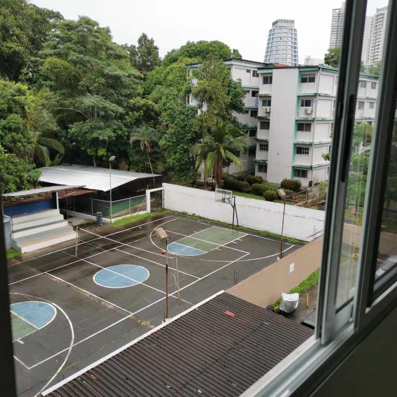 Outdoor sports court and recreational area at La Felicidad complex La Locería Panama City