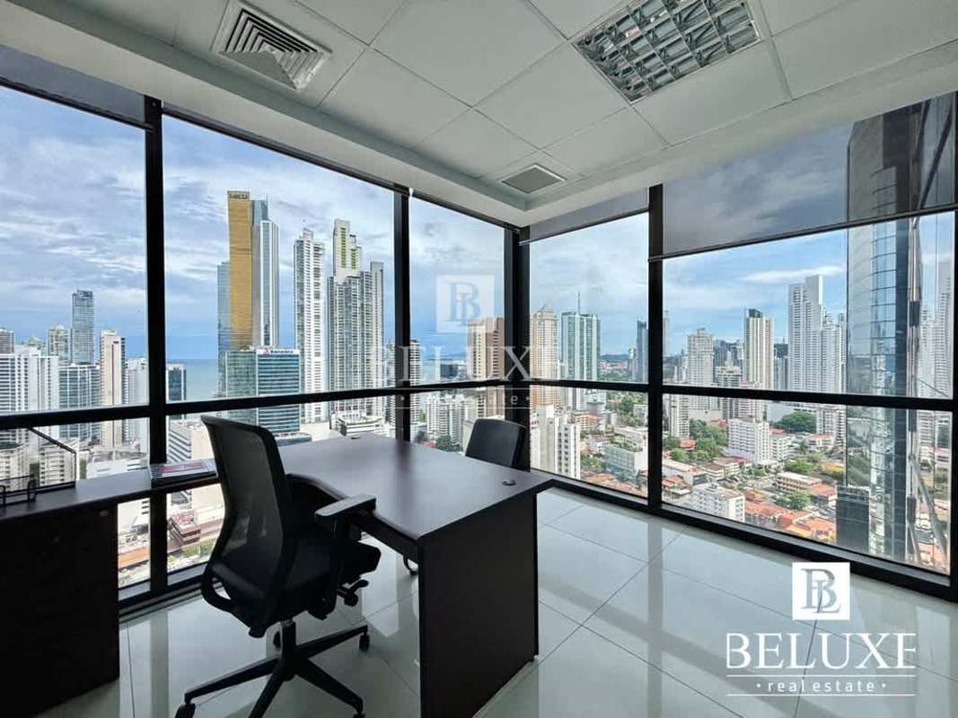 Reception with seating, glass partition and tiled floor in PH Towerbank Obarrio