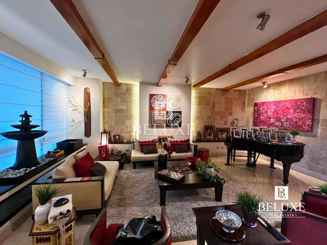 Spacious dining room with decorative ceiling and modern lighting in PH Peninsula Paitilla Panama