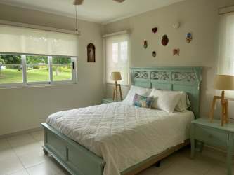 Master bedroom with access to terrace and golf course view in Bijao golf community Panama