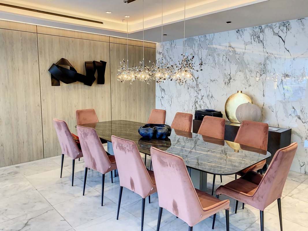 Modern luxury living and dining room with panoramic windows at PH Ocean Front Punta Paitilla Panama