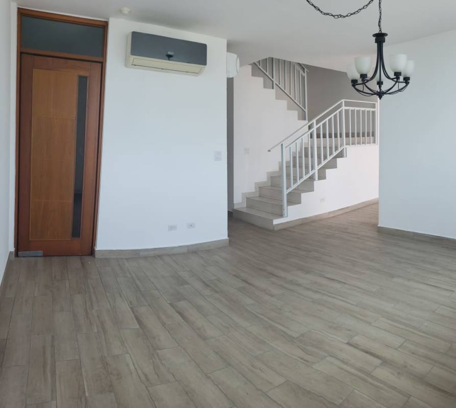 Hallway built-in wood closets neutral tiles PH Mont Royale Panama