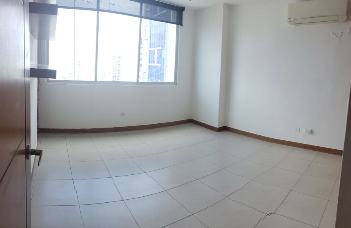 Sunlit bedroom window built-in shelves AC tiled floors PH Mont Royale El Cangrejo