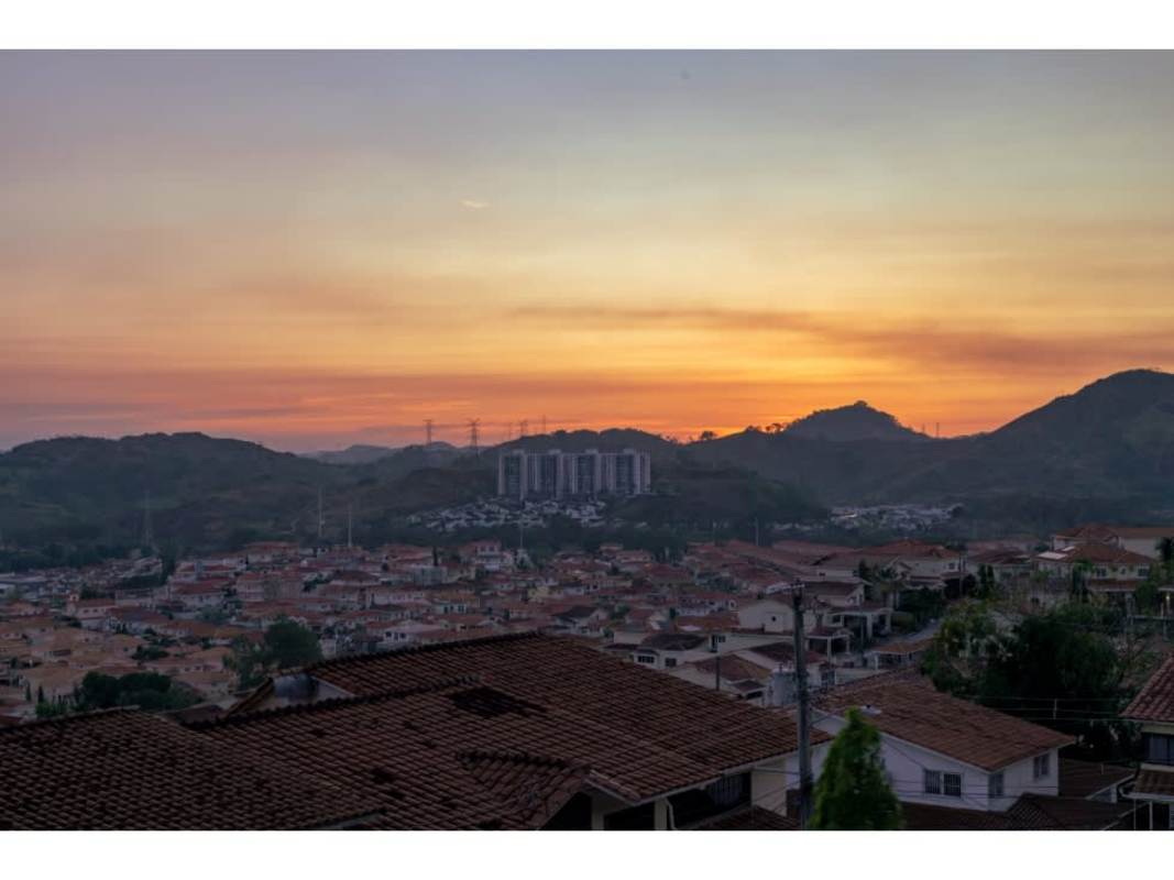 Spacious bathroom featuring bathtub, modern shower and granite surfaces in Limajos home Panama City