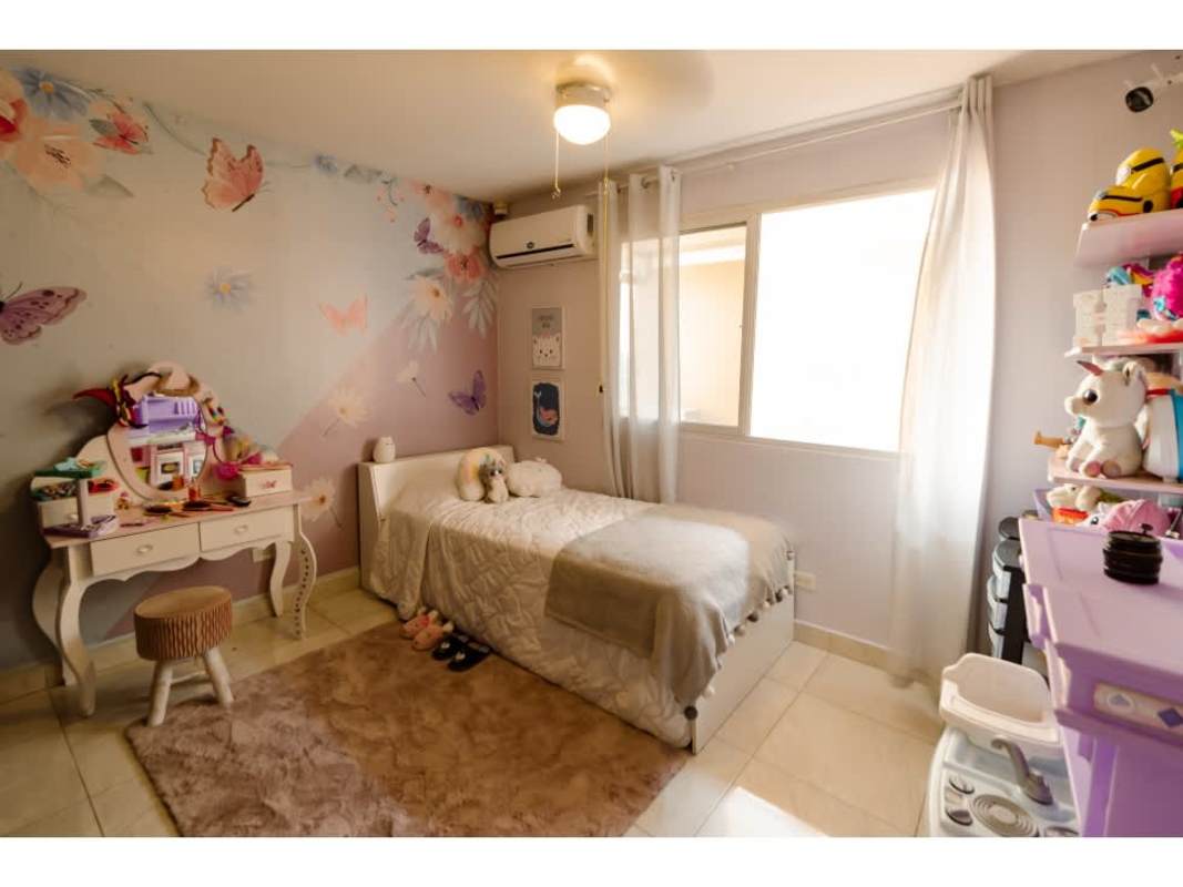 Playful children's bedroom with mural and pastel decor in house for sale Limajos Panama
