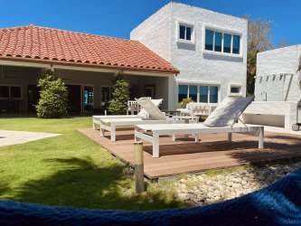 Facade of luxury Mediterranean contemporary villa Punta Barco Panama