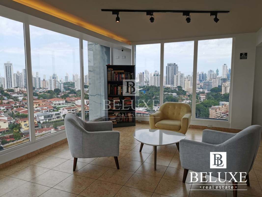 Sky lounge panoramic gym with city skyline views at PH Cosmopolitan Towers Panama