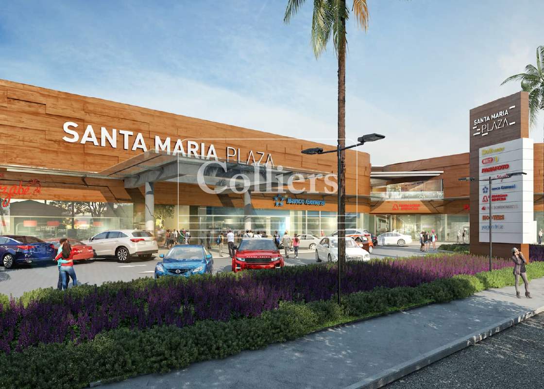 Aerial view showing modern curved wood and glass design of Santa María Plaza amidst greenery
