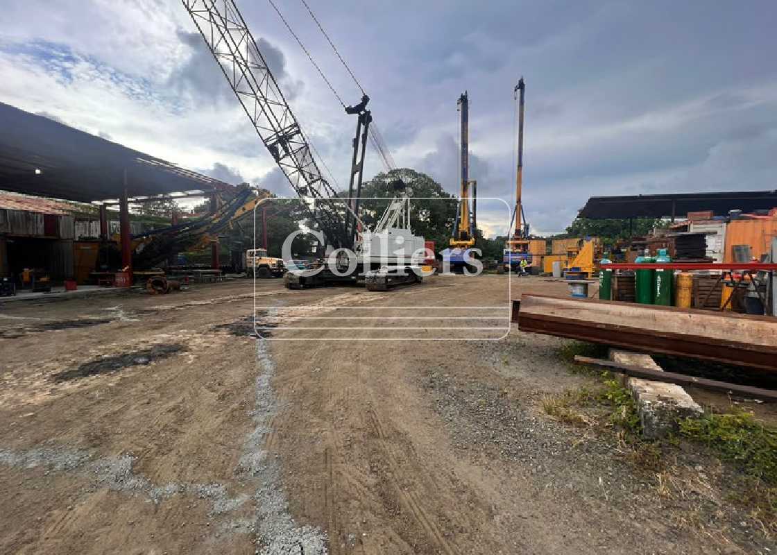 Industrial land for development with cranes, machinery, gravel surface in Las Mañanitas Panama