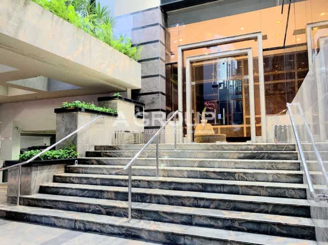 Grand marble steps with glass doors and landscaping at Villa Marina Punta Paitilla Panama