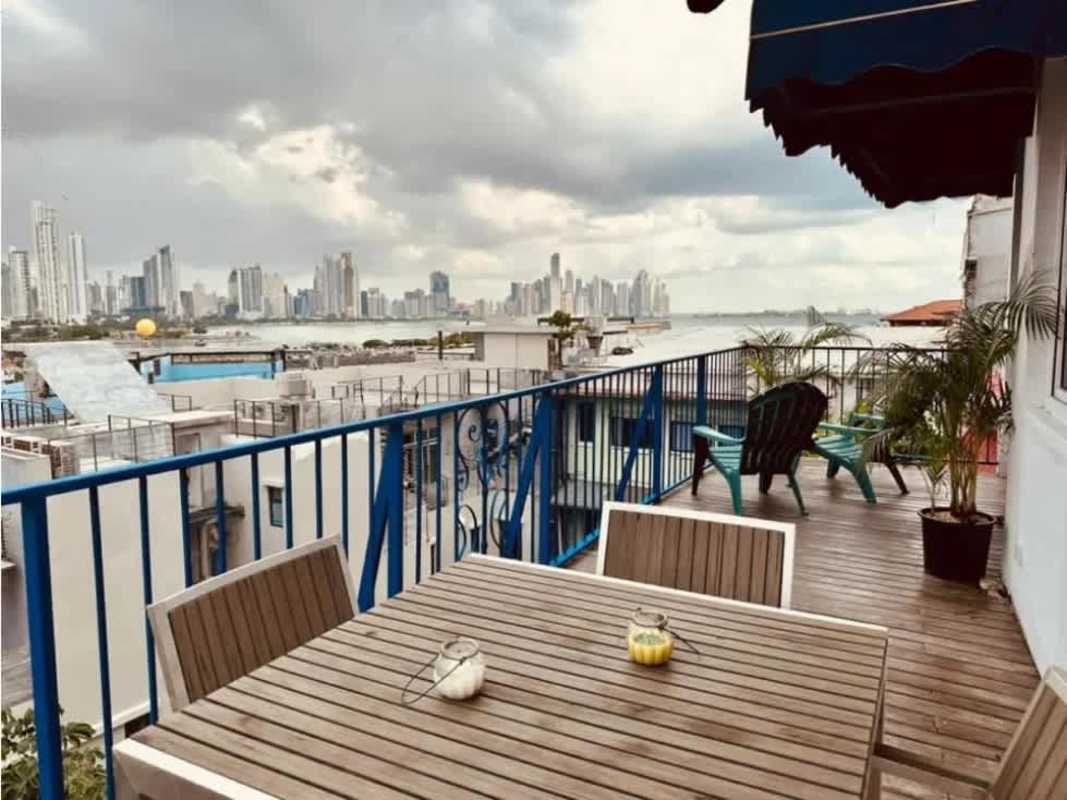 Cozy bedroom with wooden wardrobe Casco Antiguo Panama loft