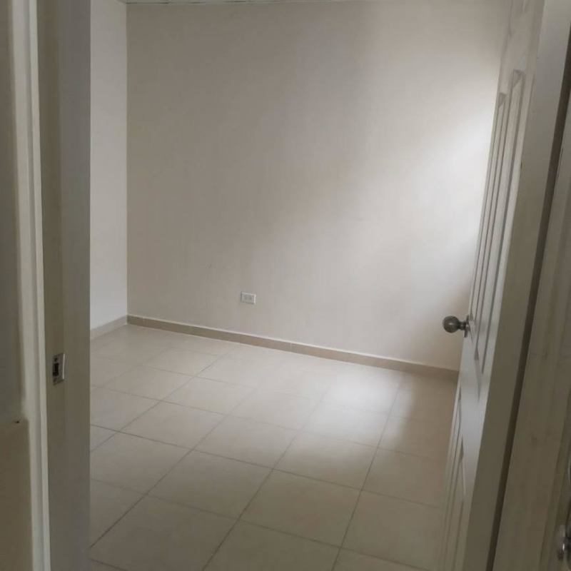 Empty room neutral walls tiled floor interior of house Pacora Panama affordable sale