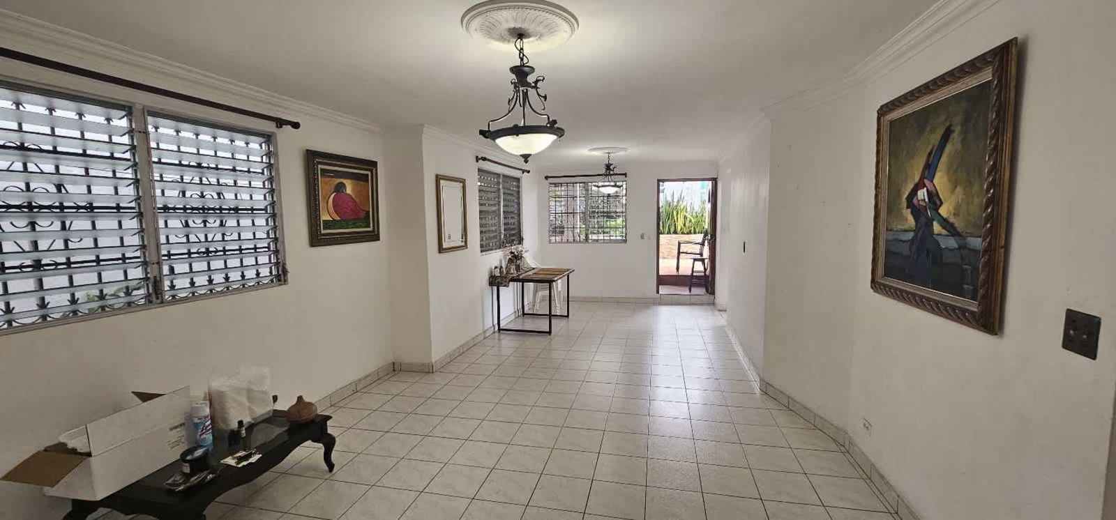 Multi-function room with workspace and exercise area in Residencial Limajo Altos de Panama house