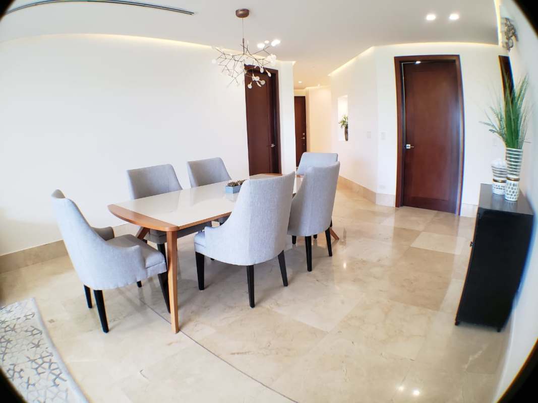 Modern kitchen with appliances and marble countertops Santa María Golf apartment Panama