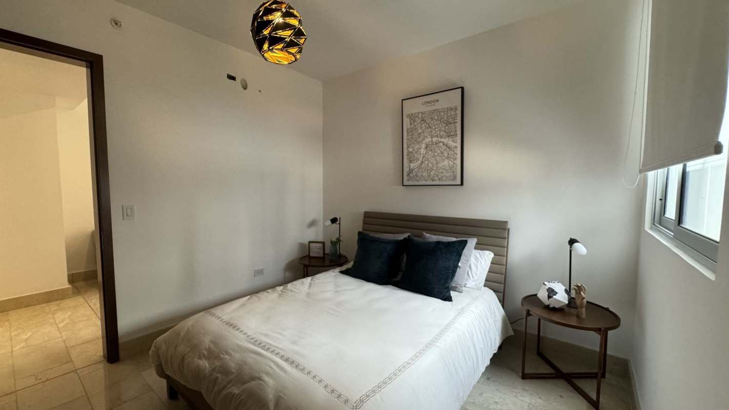 Modern bathroom with glass shower and stone tiles PH Panorama Coco del Mar