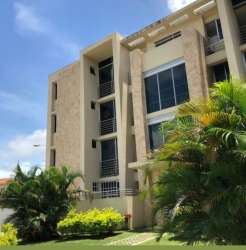 Modern apartment building with balconies and green landscaping La Chorrera Panama City outskirts