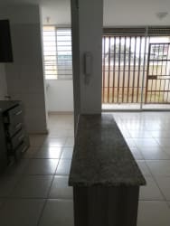 Living room tiled floor sliding doors to balcony Panama Pacifico La Chorrera apartment for rent