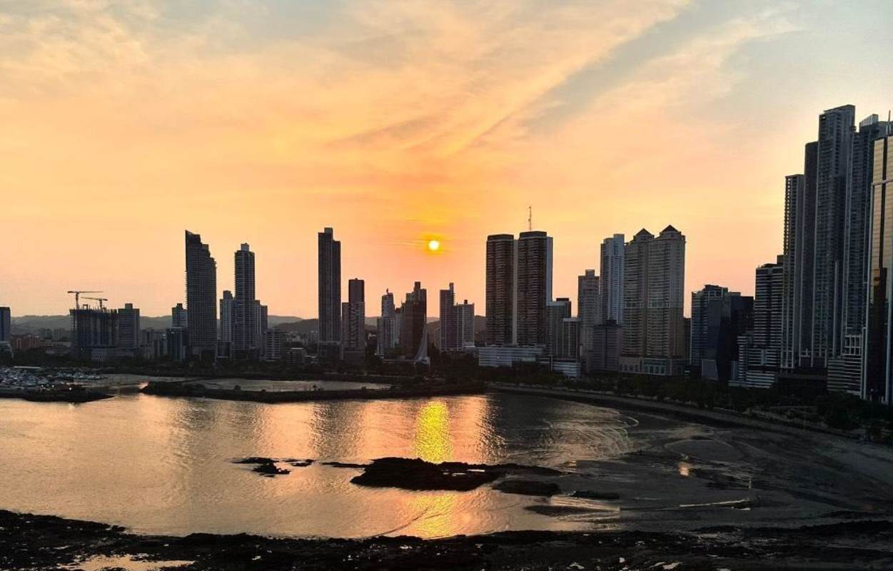 Sunset over Panama City skyline and Pacific water from PH Punta Paitilla