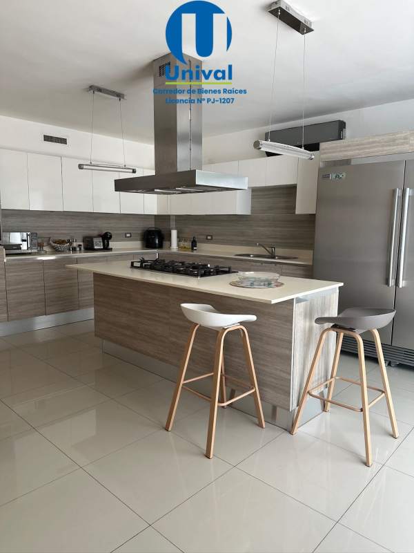 Modern master suite with closet balcony in PH Costa Esmeralda Panama City