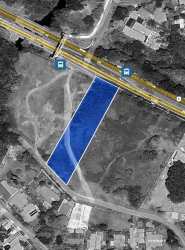 Flat commercial land with city infrastructure alongside major road ideal for development in David Chiriquí Panama