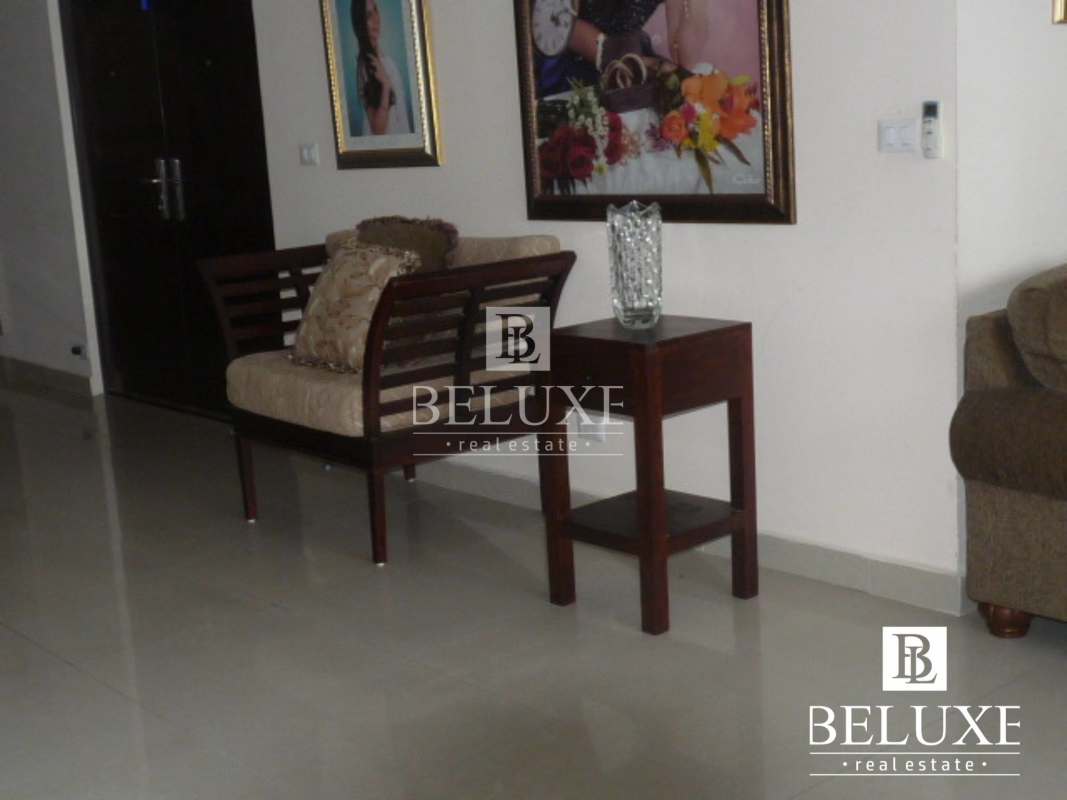 Kitchen with wooden cabinetry granite counters at PH San Francisco Bay Panama