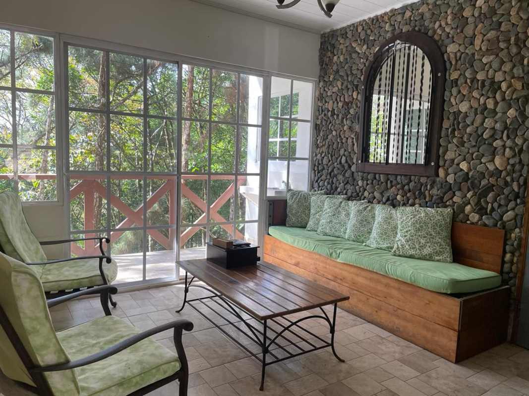 Spacious attic loft with multiple beds wood beams in Altos de Cerro Azul mountain home Panama