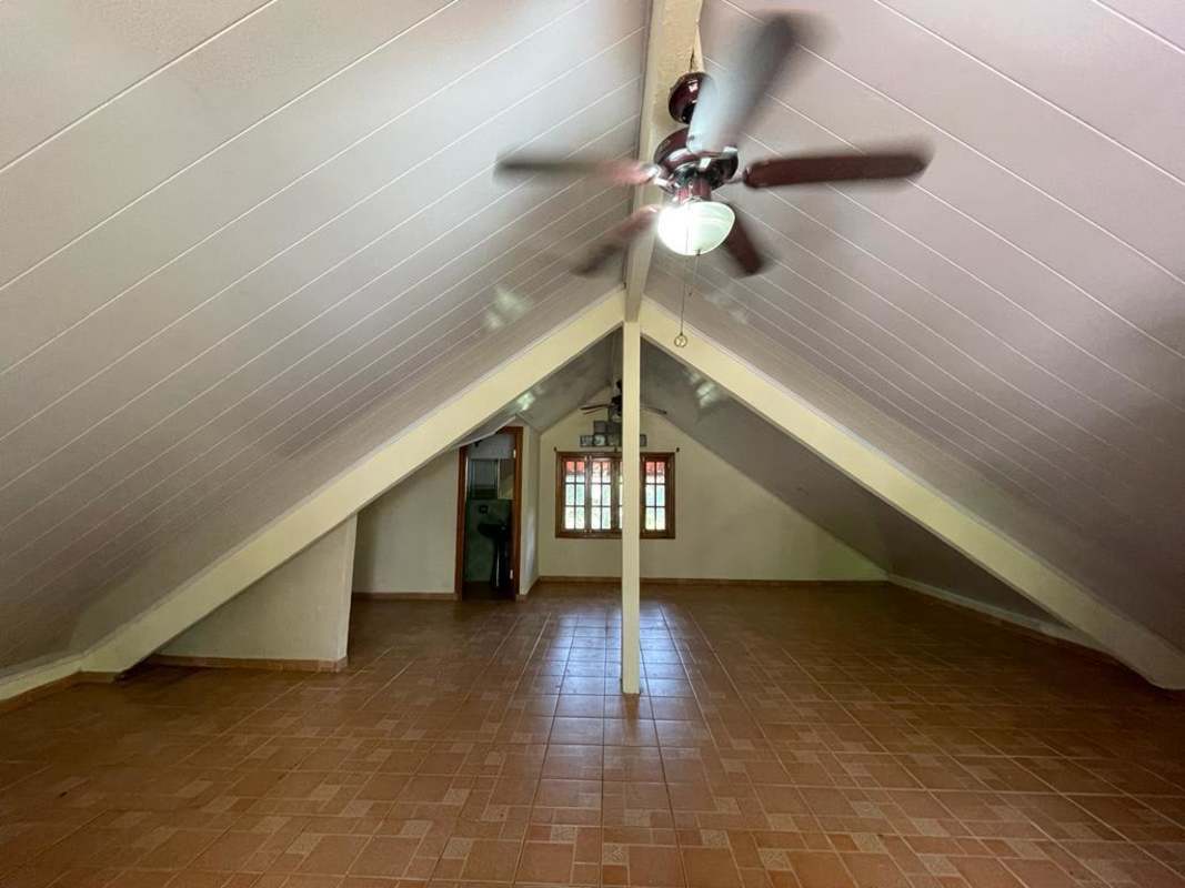 Rustic country kitchen with wood cabinets breakfast bar Altos de Cerro Azul Panama