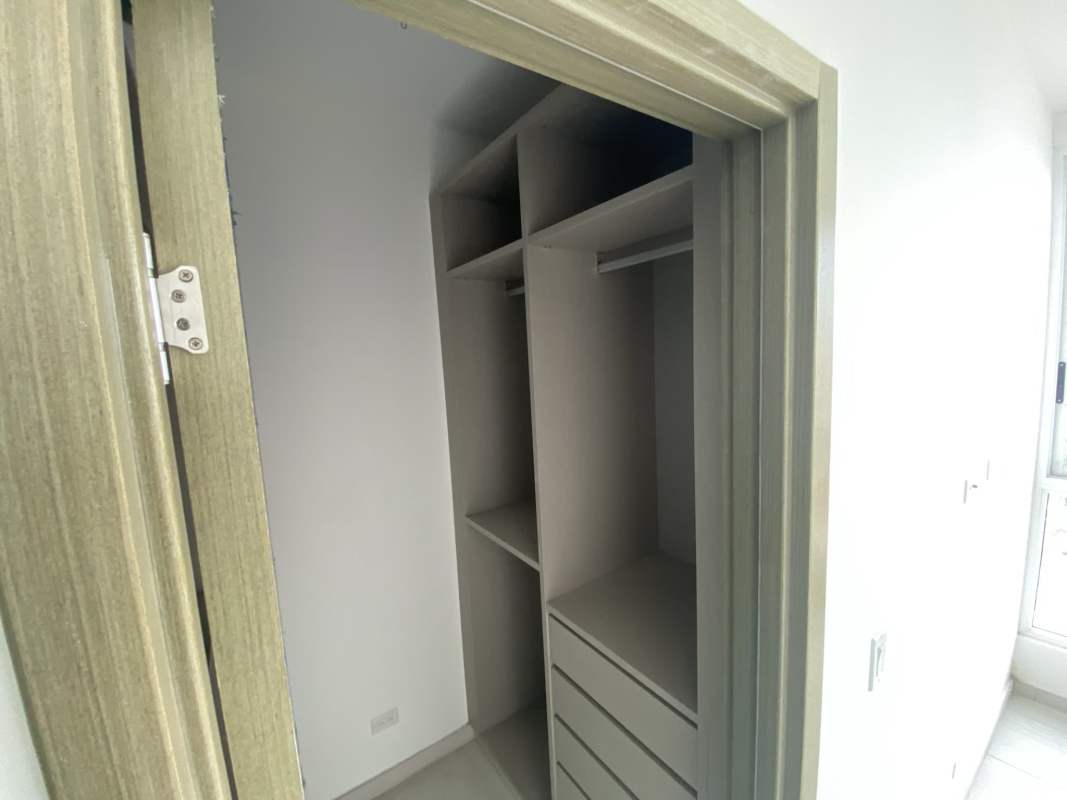 Luxury penthouse bathroom with glass shower, floating vanity The Towers Panama