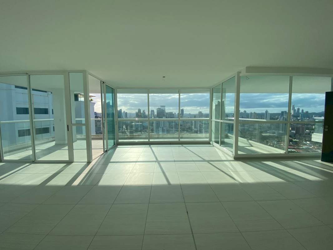 Master bedroom floor-to-ceiling windows city ocean view luxury penthouse The Towers San Francisco Panama