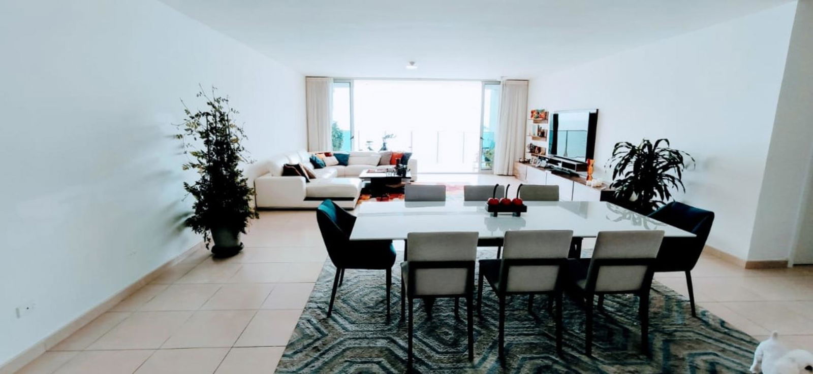 Modern kitchen with island, granite counters, stainless appliances ocean view apartment Panama