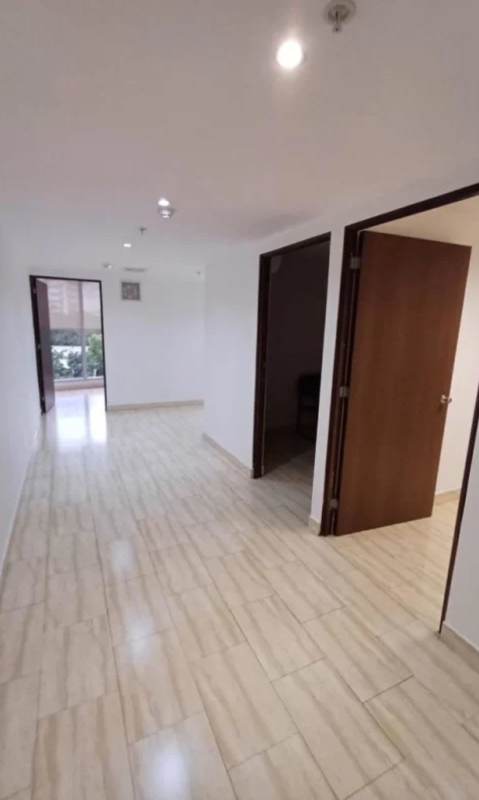 Lobby lounge area with seating, glass doors PH Denovo Panama City