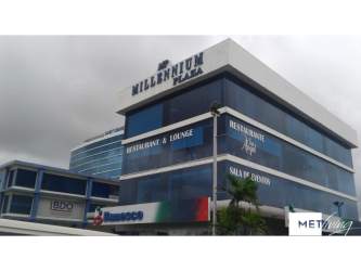 Spacious conference or event hall with banquet setup at Millennium Plaza Colón Panama