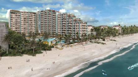 Beachfront high-rise condominium with balconies ocean view at Margaritaville Playa Caracol